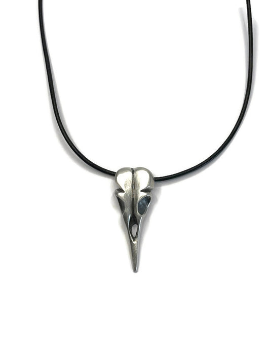 BIRD SKULL IN BRUSHED SILVER AND LEATHER