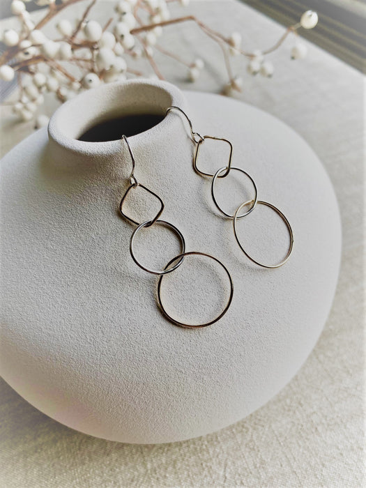 DOUBLE CIRCLE AND SQUARE LAGOM EARRINGS IN SILVER AND GOLD